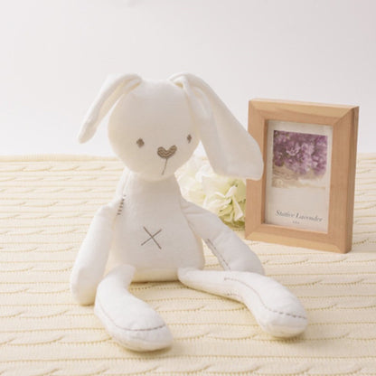 Doudou lapin poupée lapin blanc assis cadre photo