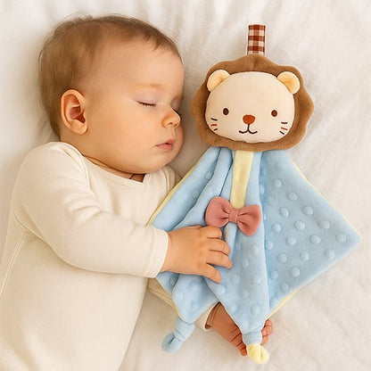 doudou lion bleu avec bébé qui dort