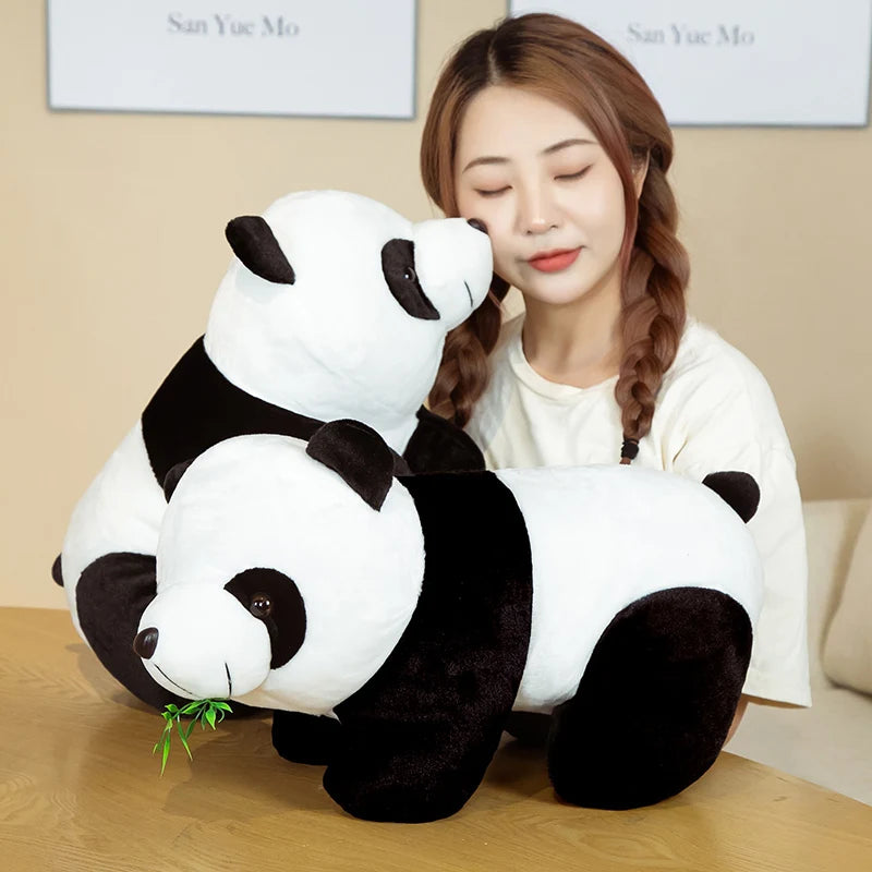 peluche panda avec grande fille deux panda